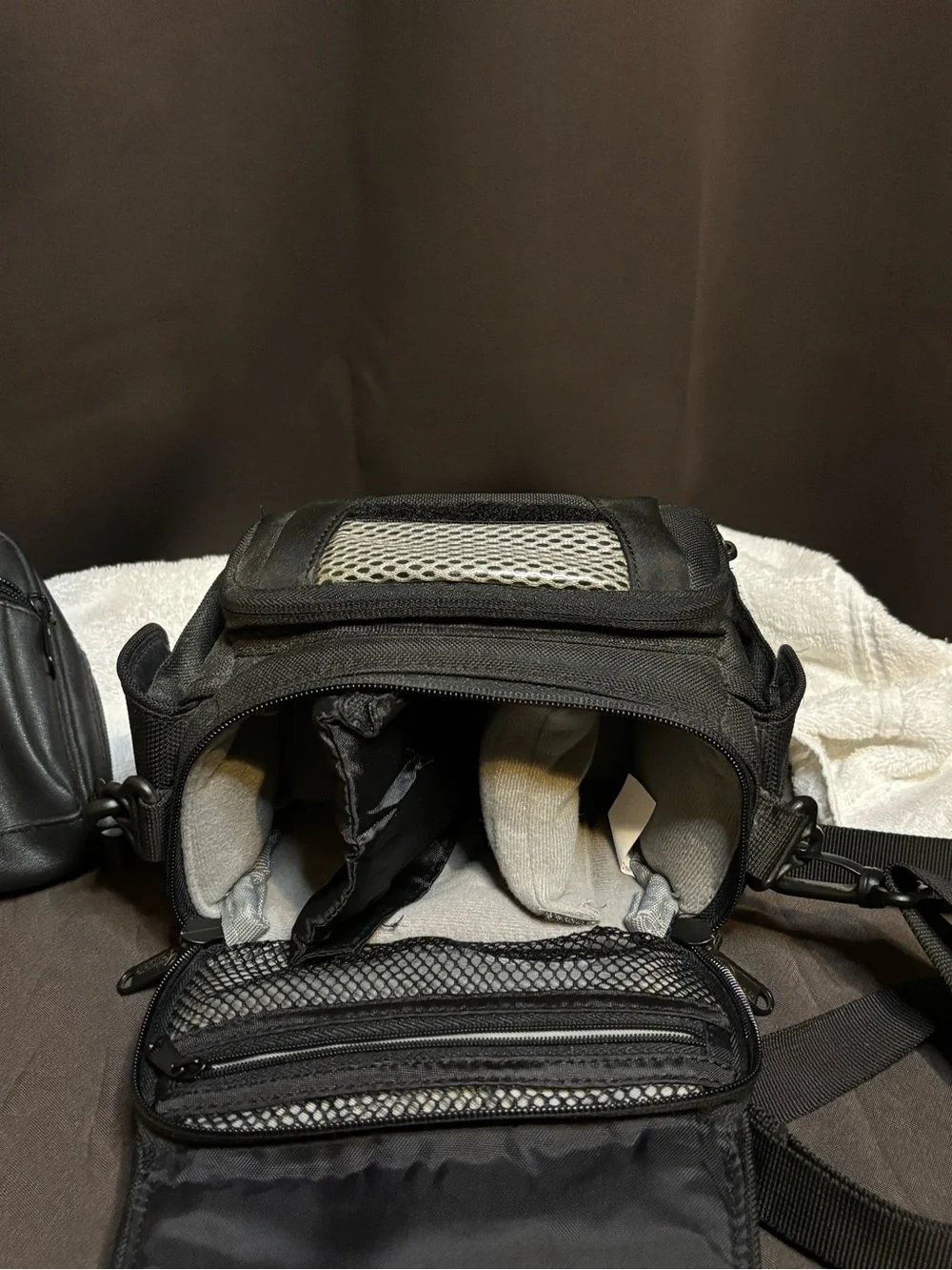 Lowepro Black Camera Shoulder Bag with Compact Holster and a free bag.